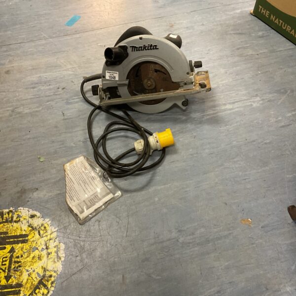 Vintage Makita 110v circular saw, a classic power tool.