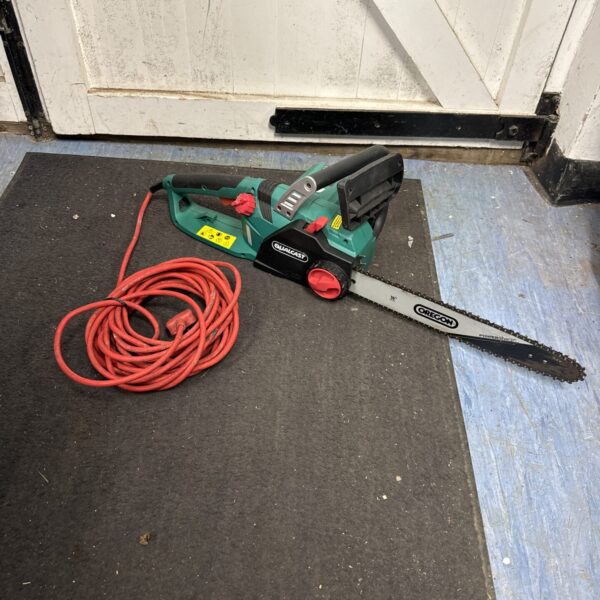 Used Qualcast electric chainsaw with power cable for garden tasks.