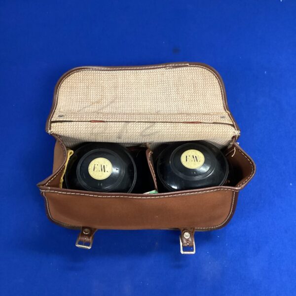 Vintage E.W garden bowls set in a leather bag.