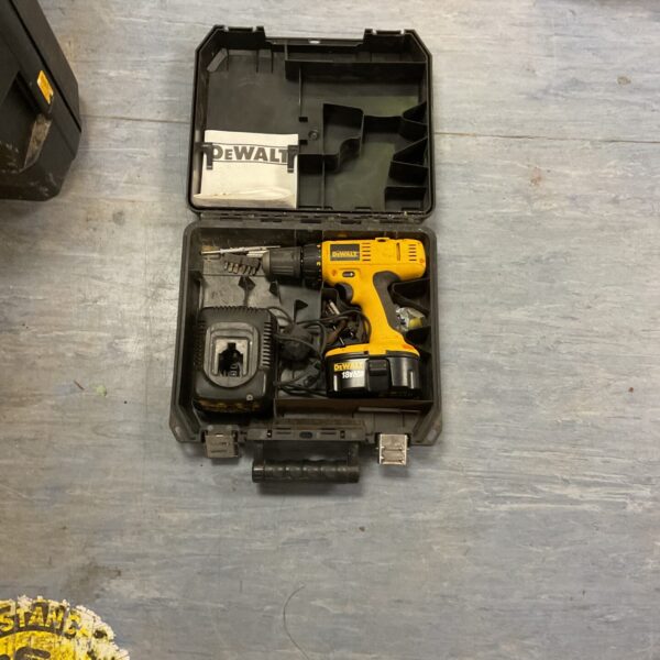 DeWalt 14.4v cordless drill driver in open case.