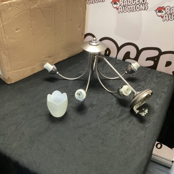 Vintage chrome ceiling light with frosted glass shades.