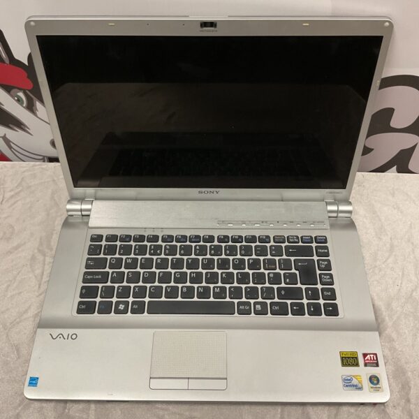 Silver Sony Vaio laptop, vintage computing, for parts or collection.