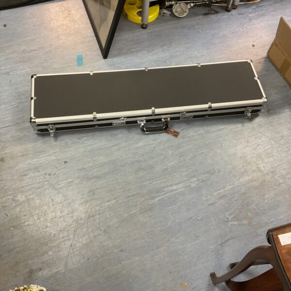 Black gun case with code lock, top view.