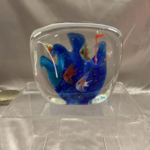 Vintage Murano glass paperweight with bird design.