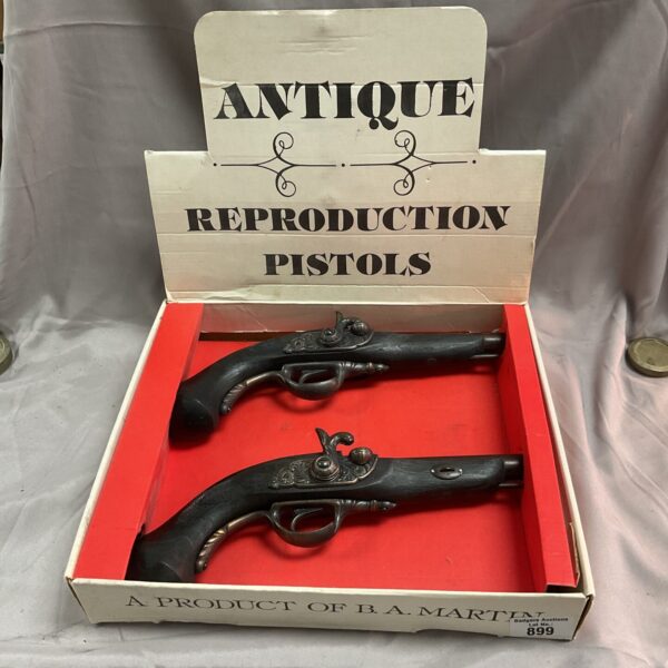 Pair of antique reproduction flintlock pistols by B A Martin.