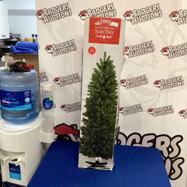 Tesco 6.5ft slim Christmas tree in box, festive holiday decoration.