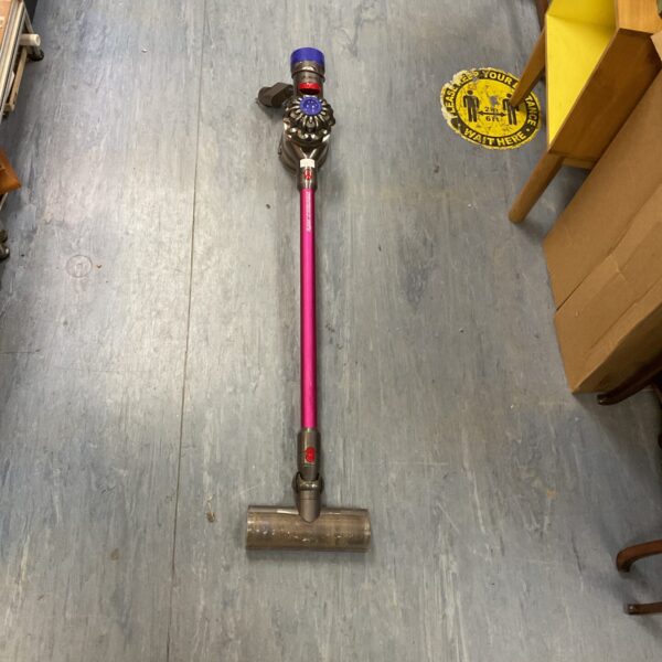 Front view of a purple Dyson v7 Motorhead cordless vacuum cleaner.