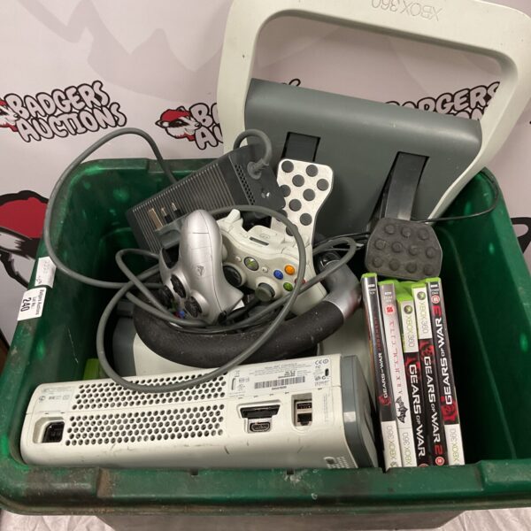 Xbox console with games and accessories bundle for sale.
