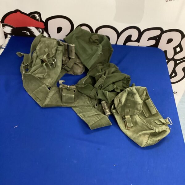 Vintage military webbing pouch belt with multiple pouches.