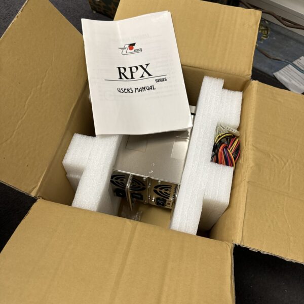 New RPX series server power supply unit in original packaging.