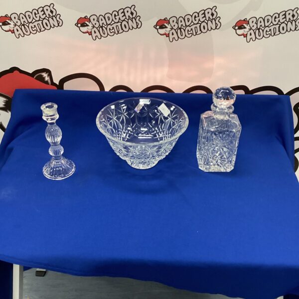 Elegant crystal fruit bowl, decanter, and candle holder set.