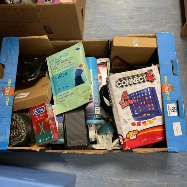 Mixed toy lot featuring a Connect 4 game and other vintage items.