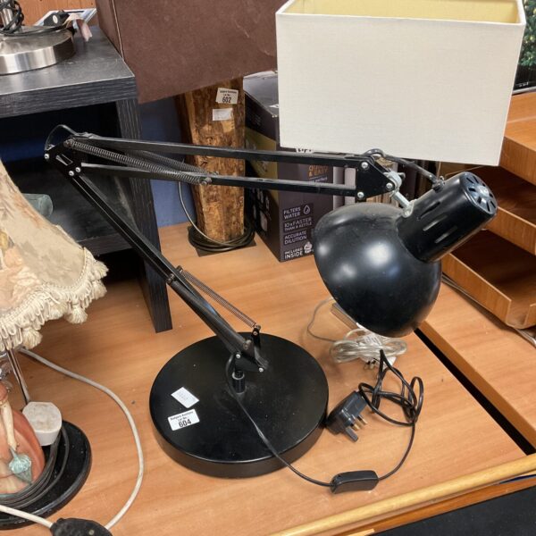 Large black Anglepoise lamp with adjustable arm, vintage industrial style.