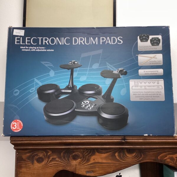 Close-up of electronic drum pads for music production.