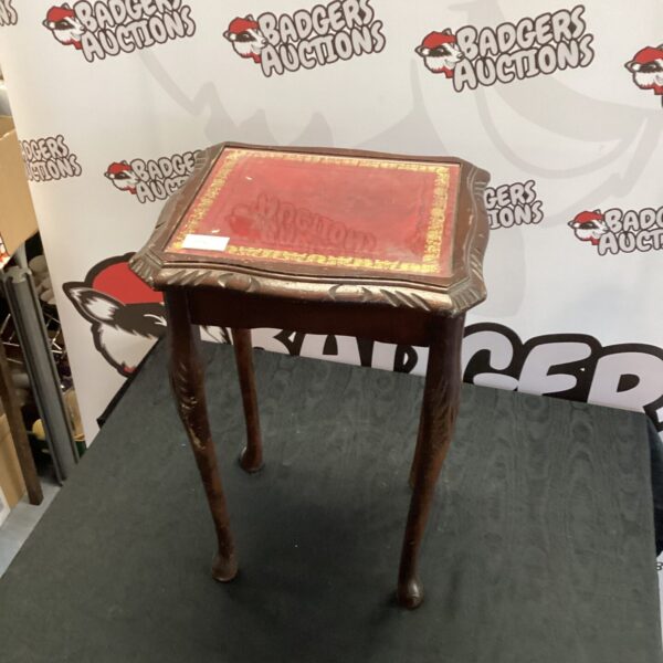 Dark wood inlaid wine table with turned legs.