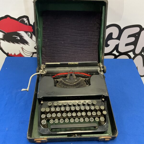 Vintage Sterling typewriter in its original carrying case.
