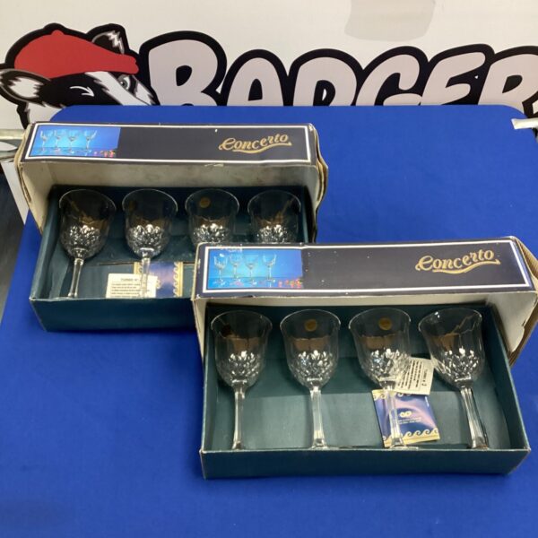 Two boxes of vintage Concerto Capri crystal glasses.