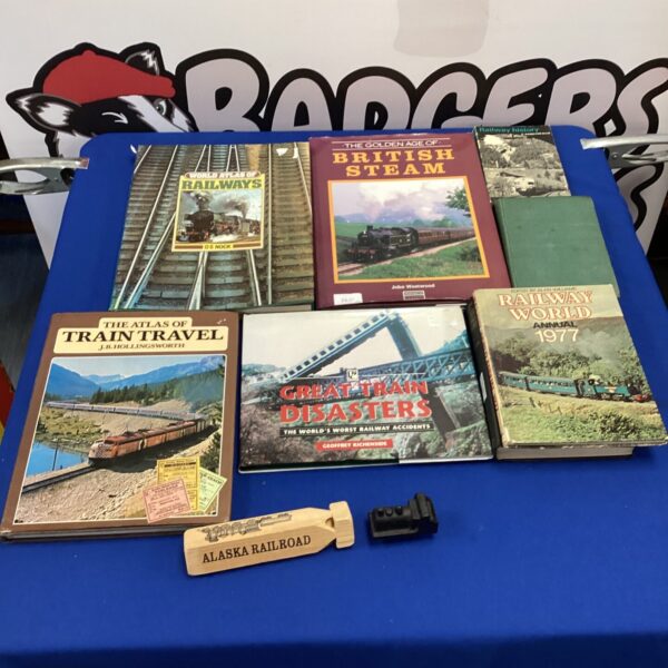 Vintage collection of railway books detailing train history.