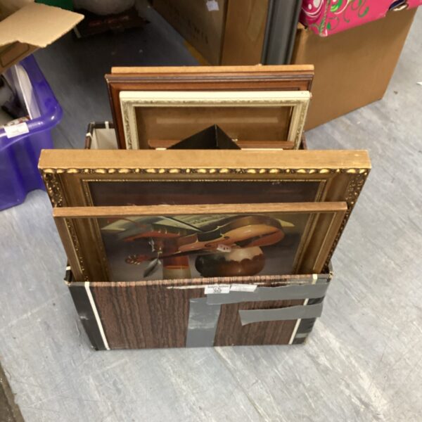 Assorted vintage picture frames in a lot, ready for display.
