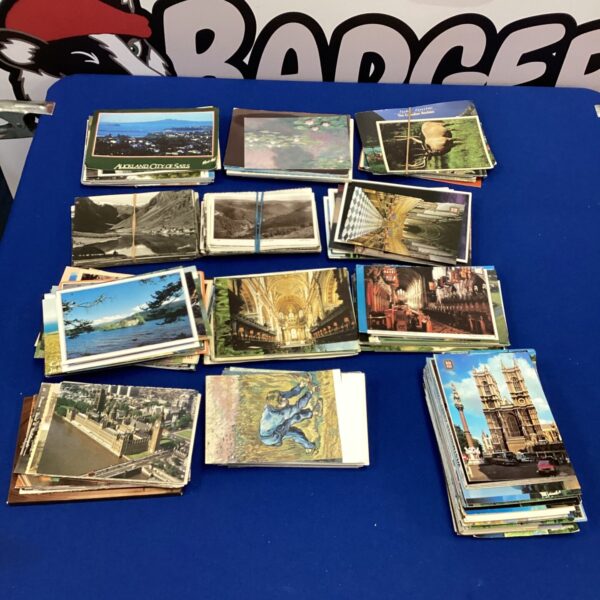 Vintage postcard collection featuring world travel scenes.