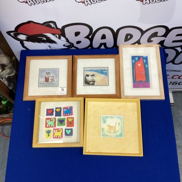 Framed vintage nursery pictures, charming children's wall art.