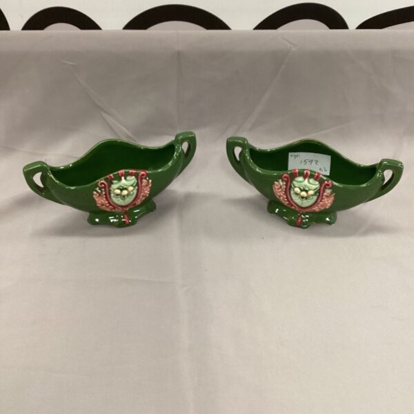 Antique Austrian porcelain mini vases with floral design.