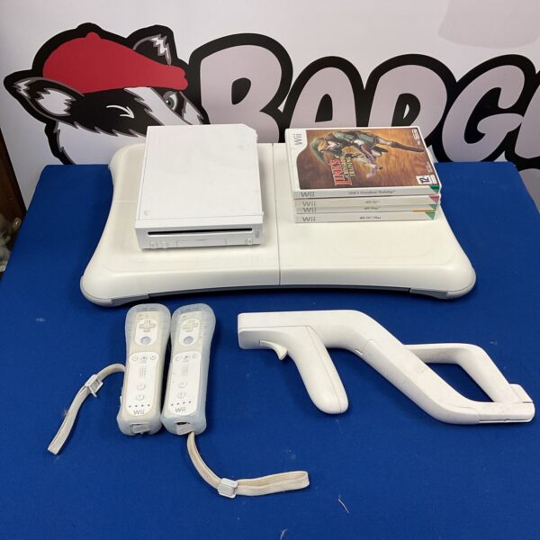 Nintendo Wii console with controllers and games for retro gaming.
