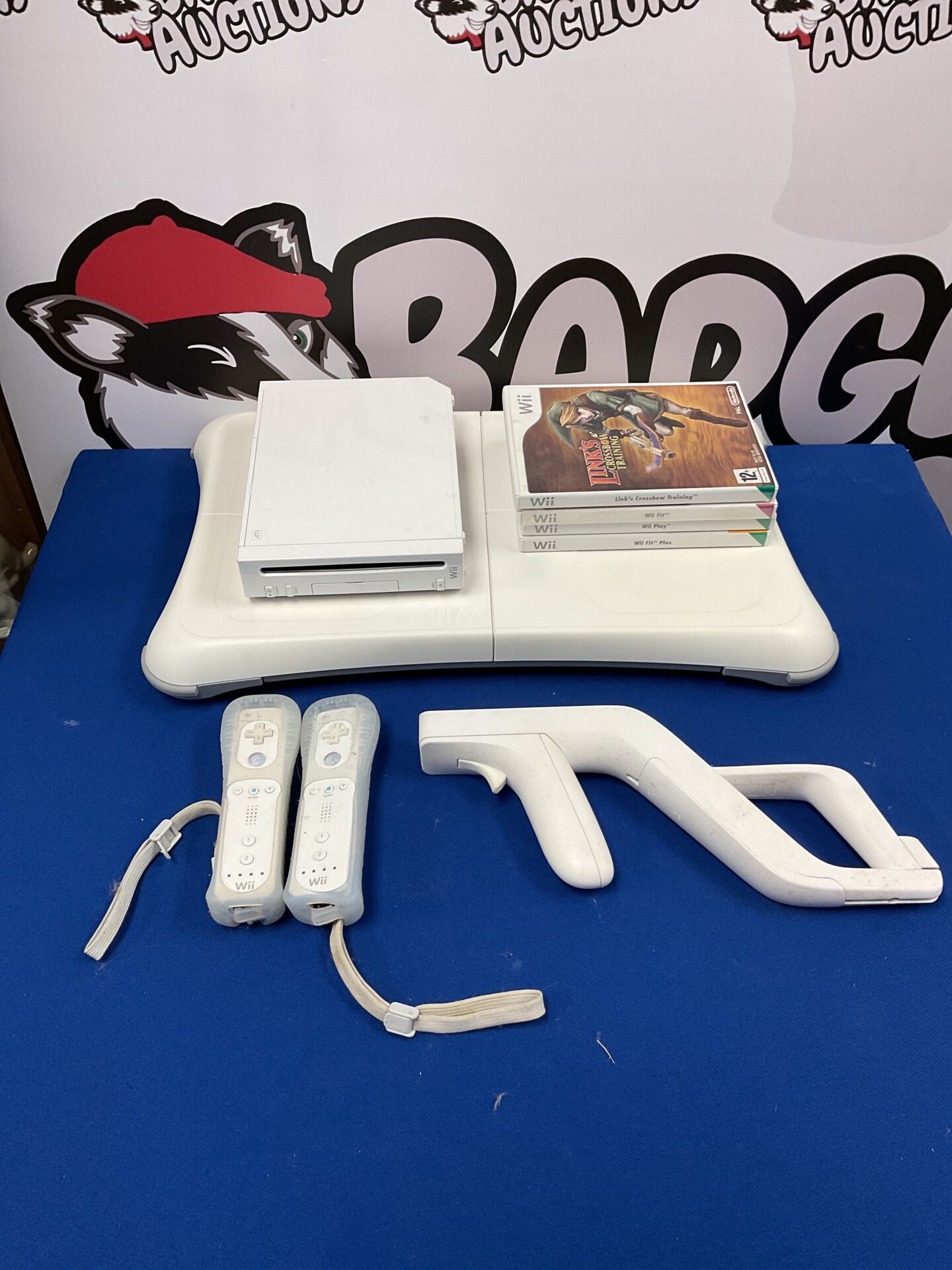 121 Nintendo Wii console, cables, two controllers, accessories and 4 games