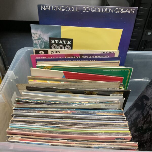 Large lot of vintage vinyl records including Nat King Cole and Glenn Miller.