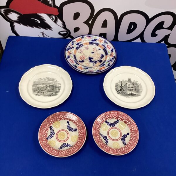 Vintage Villeroy Boch plates in a collectible lot.