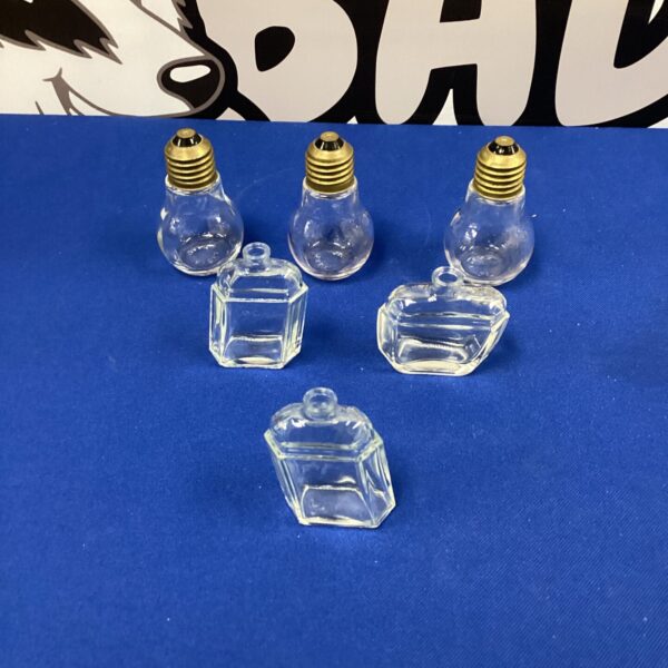 Vintage glass scent bottles, a collectible selection for perfume enthusiasts.