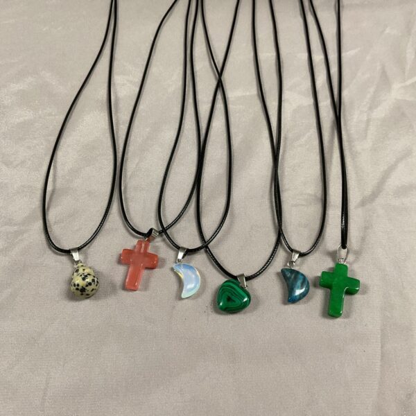 Bundle of five colourful crystal rope necklaces with gemstone pendants.