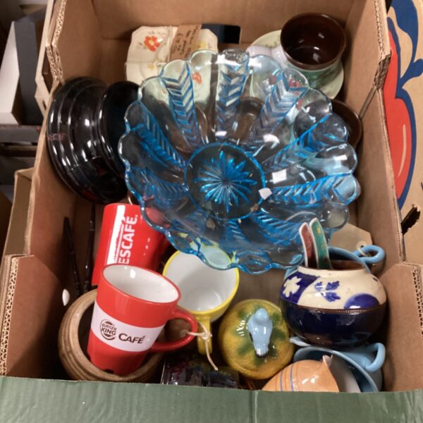Mixed kitchenware lot with glass fruit bowl and colourful dishes.