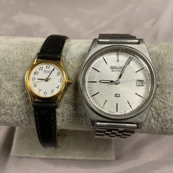 Vintage Seiko Quartz wristwatches pair, classic Japanese design.