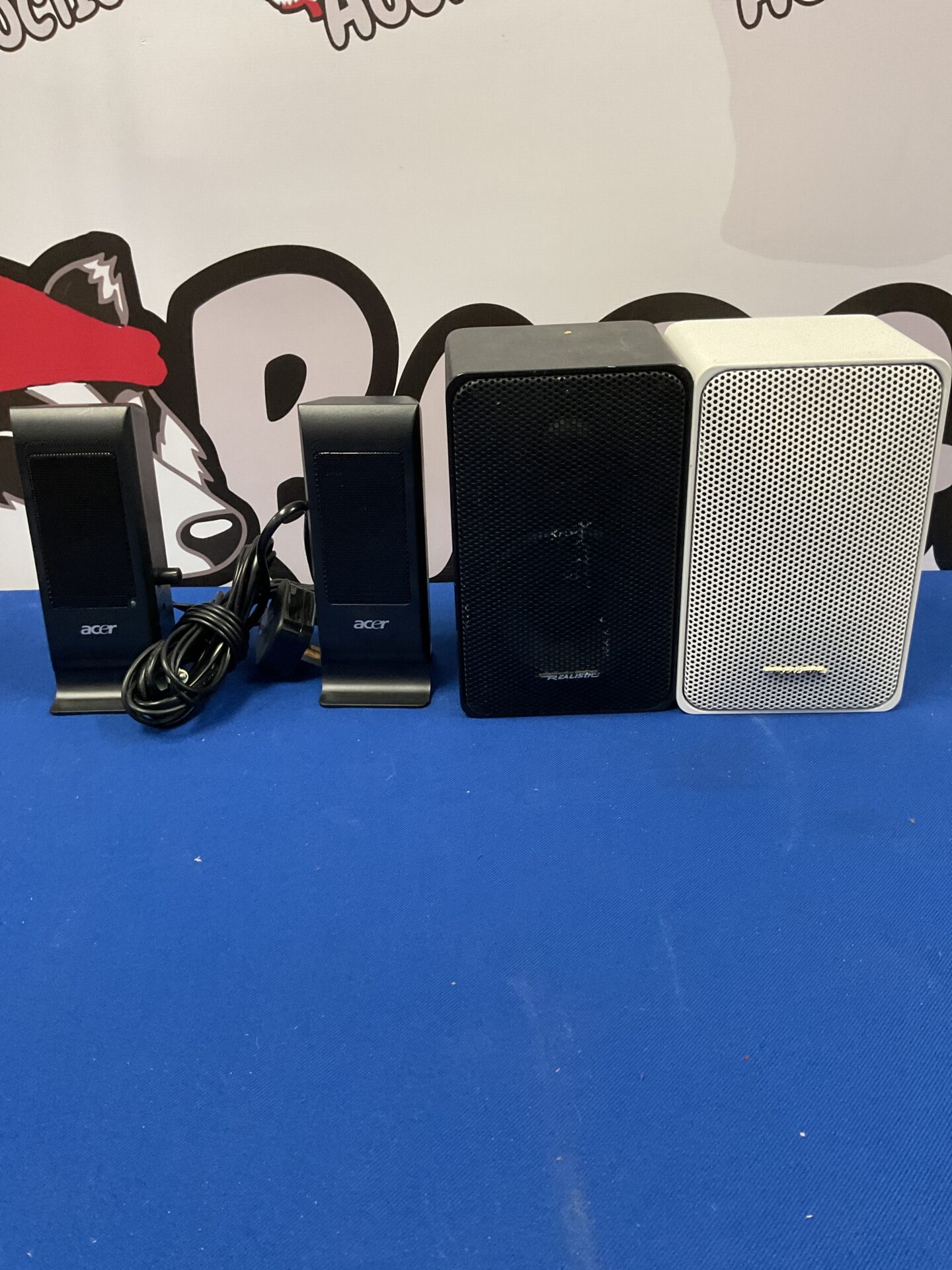 149 Pair of realistic speakers with a pair of acer pc speakers