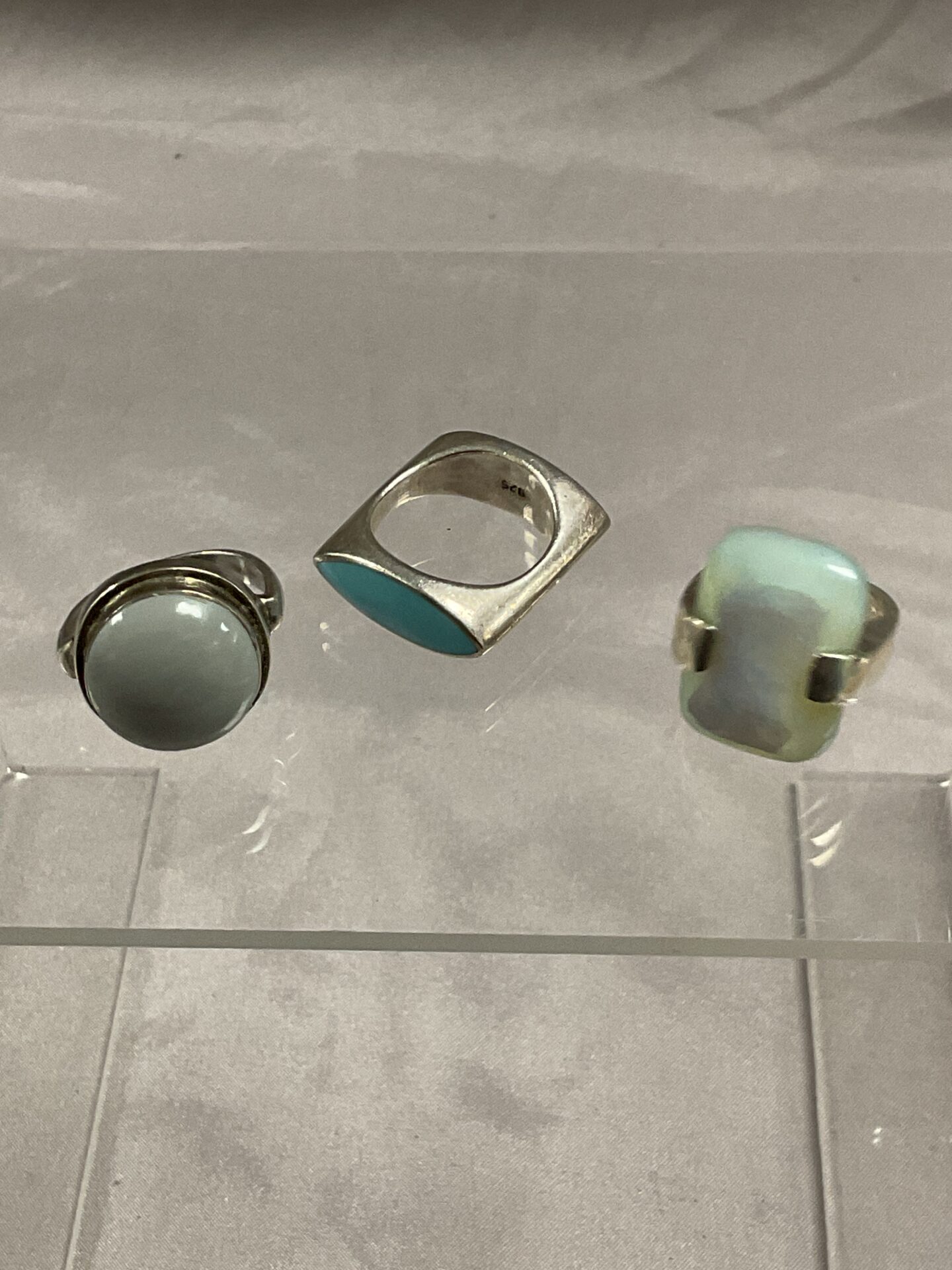 854 Three 925 silver stone set rings sizes K N P 25.4g gross