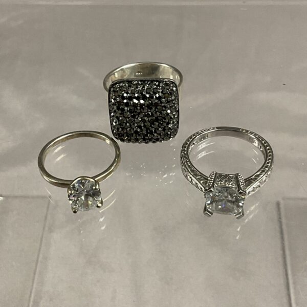Classic silver solitaire ring with a brilliant-cut stone.