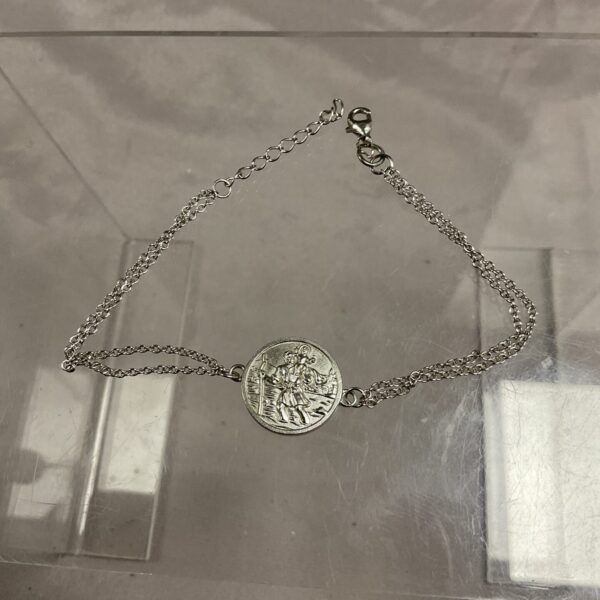 Silver St Christopher bracelet with detailed medal.