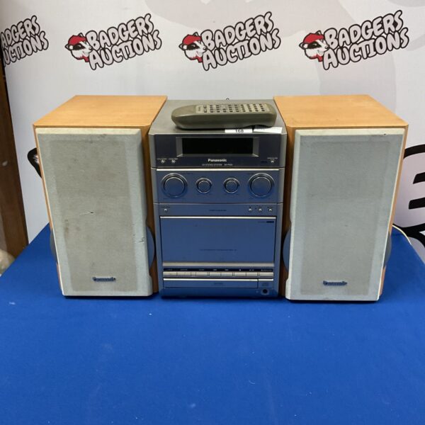 Silver Panasonic SA-PM22 CD stereo system with speakers.