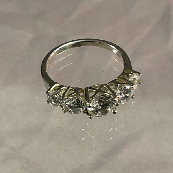 Sparkling silver ring with cubic zirconia stones.