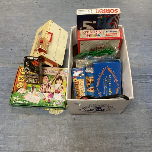 Mixed toy lot including board games and a PSP console.