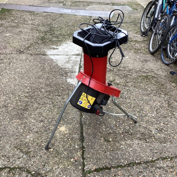 Electric Sovereign garden shredder for reducing garden waste.