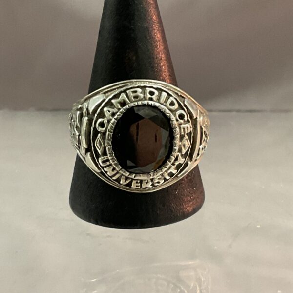 Silver Cambridge University signet ring with red stone.