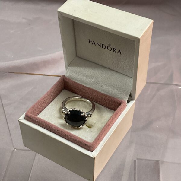 Pandora silver ring size K with black cubic zirconia stones.