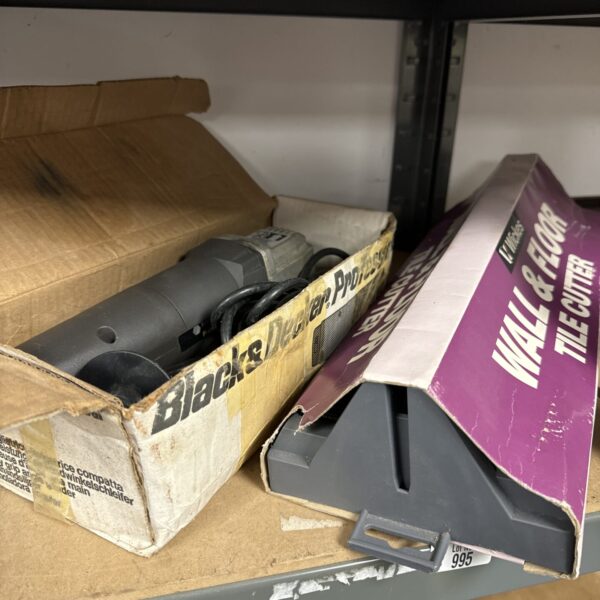 Black and Decker tile cutter with angle grinder packaging.
