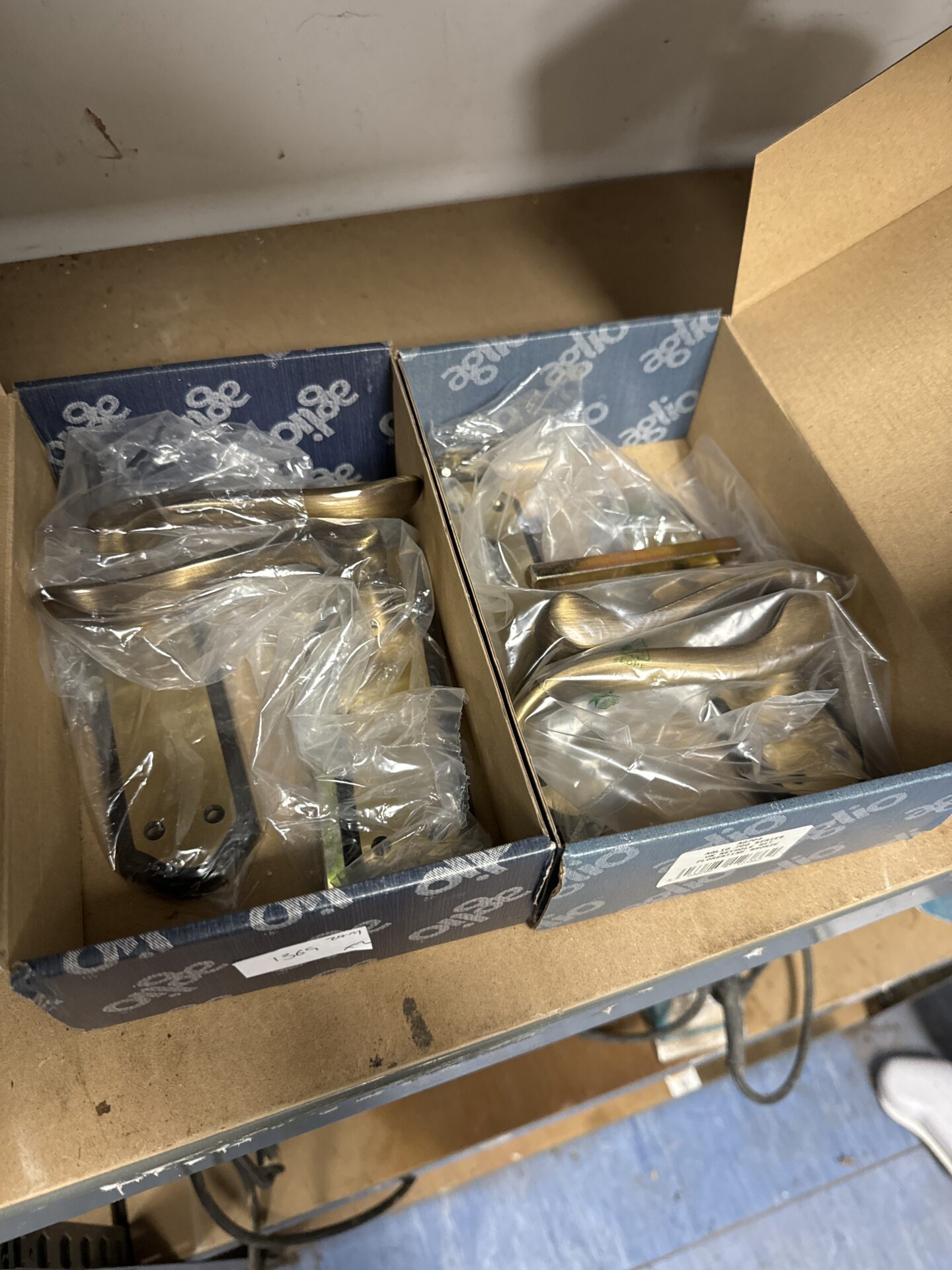 997 Two pairs of new aglio black/bronze door handles