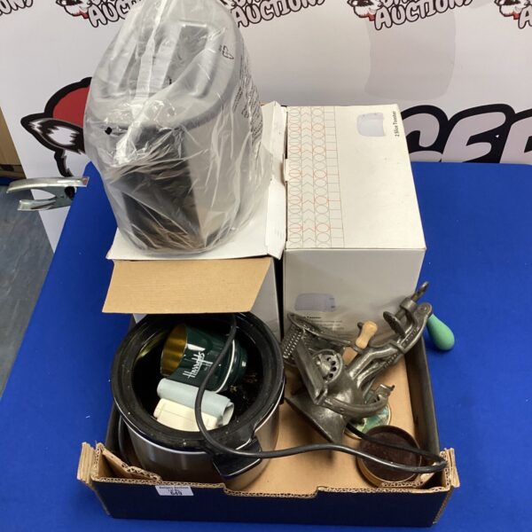 Vintage kitchen appliances lot including toasters and meat grinder.