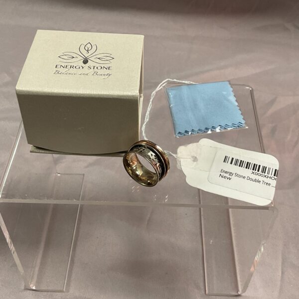 Sterling silver spinner ring with copper and steel bands, size Q.