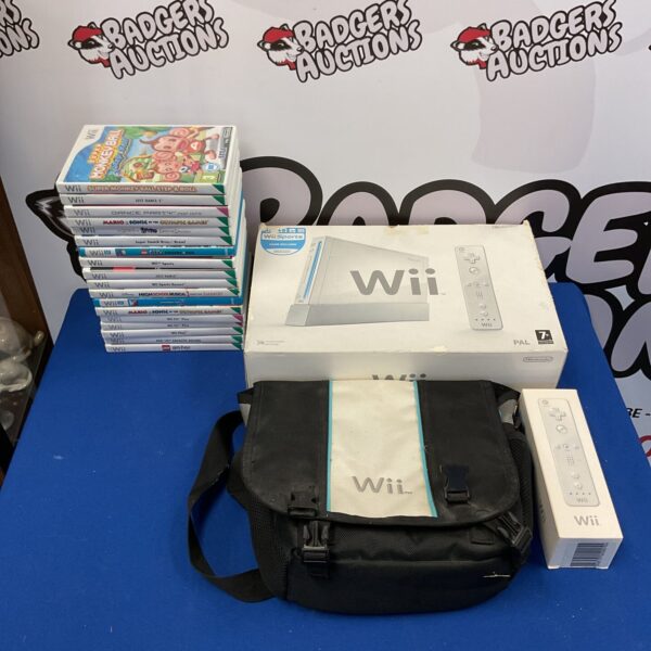 Boxed Nintendo Wii console with games and accessories.