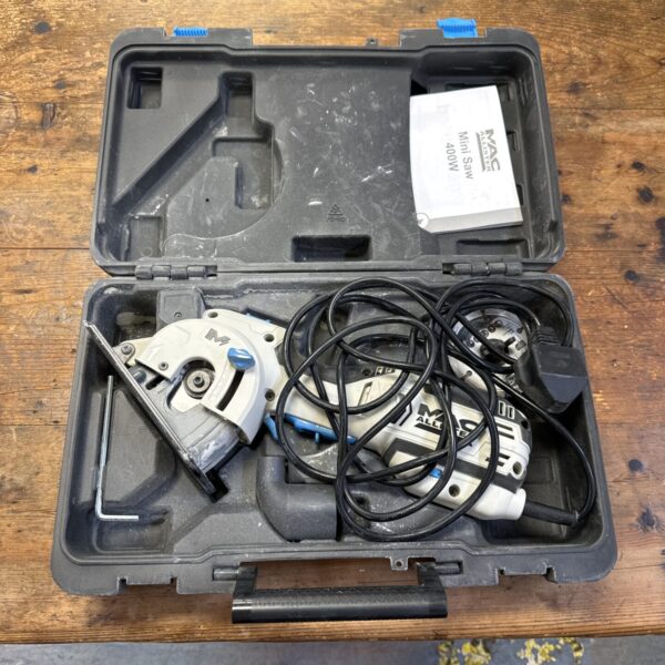 Mac Allister 400w mini saw in its original carrying case.